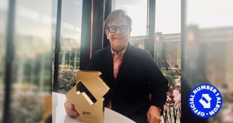 Elton John with his Number 1 album award for Diamonds